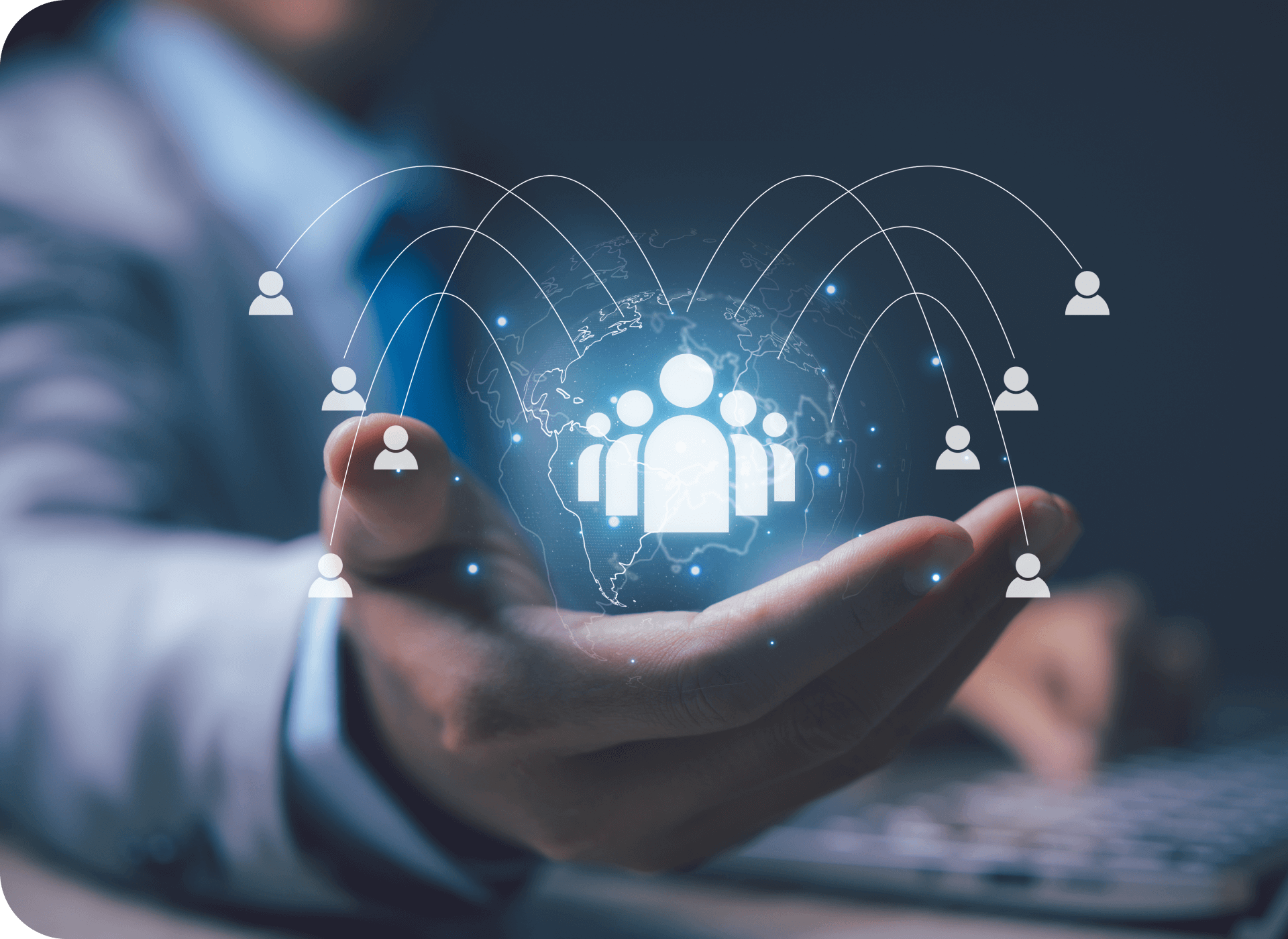 Hand holding digital network of people icons.
